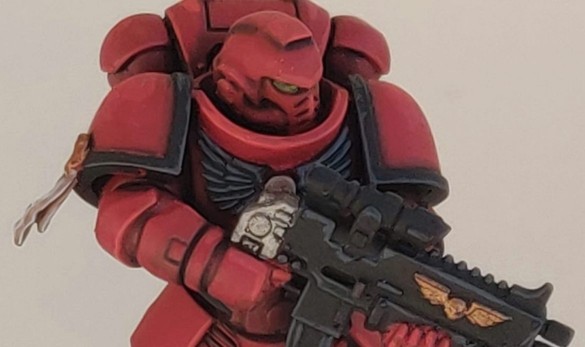 Close up of a painted Blood Angels Intercessor.