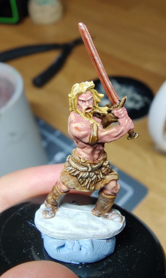 A front view of the completed barbarian miniature.