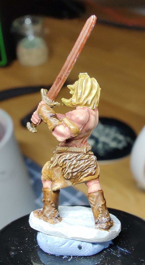 A rear view of the completed barbarian miniature.