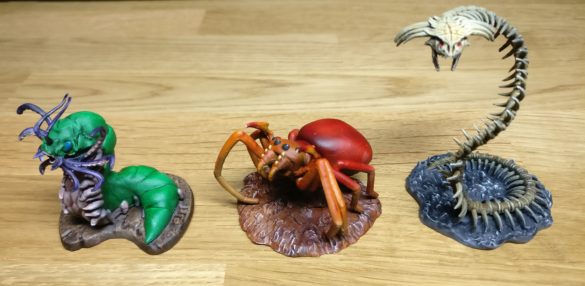 Three DND miniatures painted with AP Speed Paints.