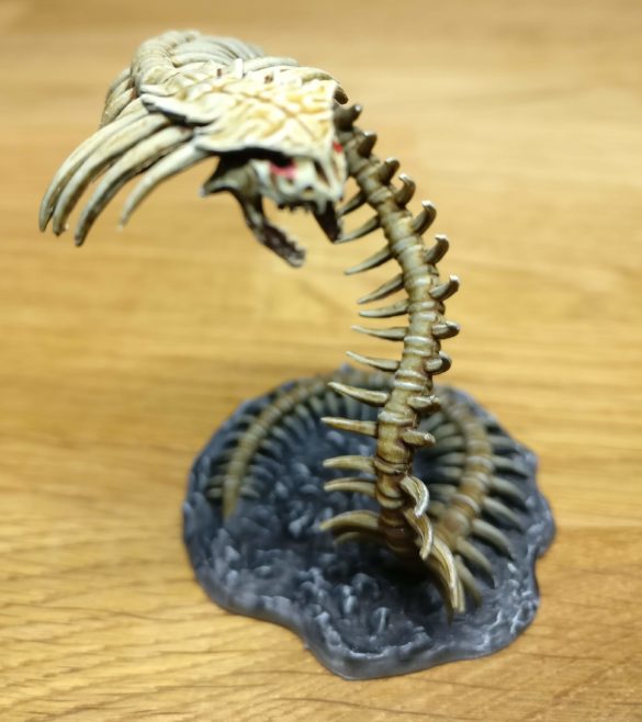 A DND Bone Naga, brush painted with Speed Paints.