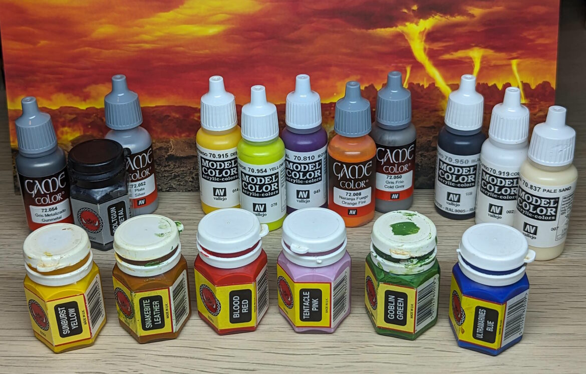 A range of 1990s Citadel and modern Vallejo paints used